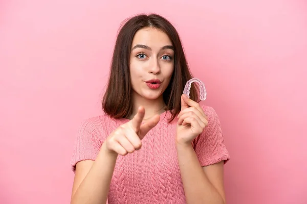 Young Ukrainian Woman Holding Invisible Braces Isolated Pink Background Surprised — Stock Photo, Image