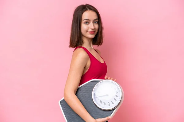Young Ukrainian Woman Isolated Pink Background Weighing Machine — Foto de Stock