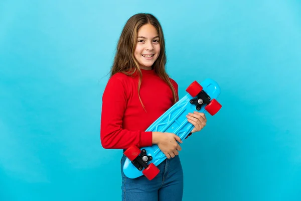 Little Girl Isolated Blue Background Skate Happy Expression — Stock Photo, Image