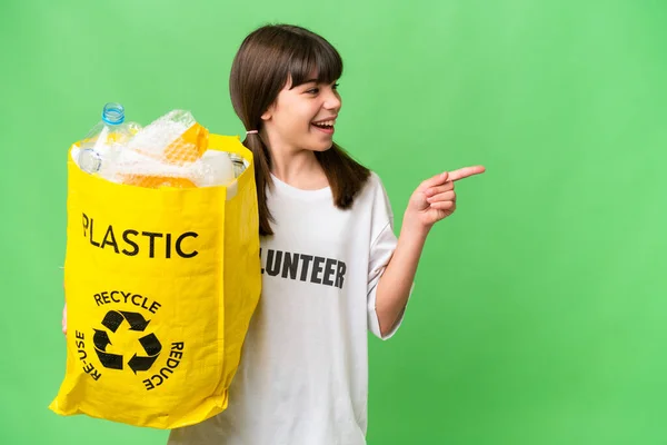 Little Caucasian Girl Holding Bag Full Plastic Bottles Recycle Isolated — 스톡 사진