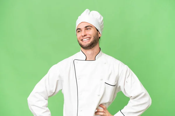 Jovem Bonito Chef Homem Sobre Isolado Fundo Posando Com Braços — Fotografia de Stock