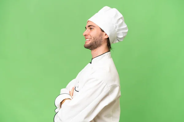 Jovem Bonito Chef Homem Sobre Fundo Isolado Posição Lateral — Fotografia de Stock