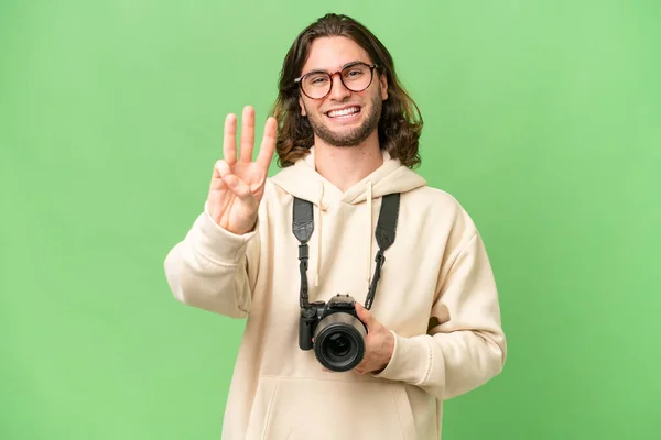 Joven Fotógrafo Hombre Sobre Fondo Aislado Feliz Contar Tres Con — Foto de Stock