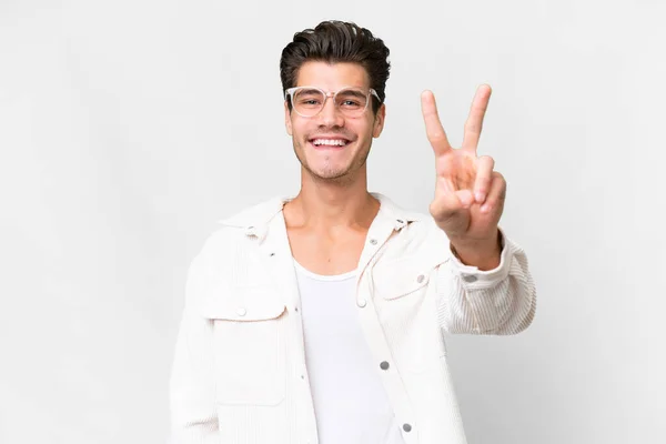 Jonge Knappe Blanke Man Geïsoleerde Witte Achtergrond Glimlachen Tonen Overwinning — Stockfoto