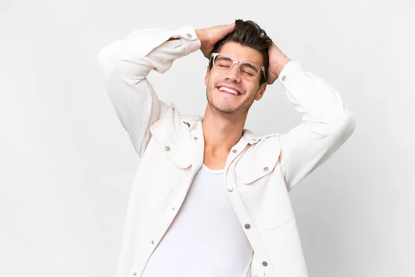 stock image Young handsome caucasian man over isolated white background laughing