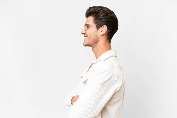 stock image Young handsome caucasian man over isolated white background in lateral position