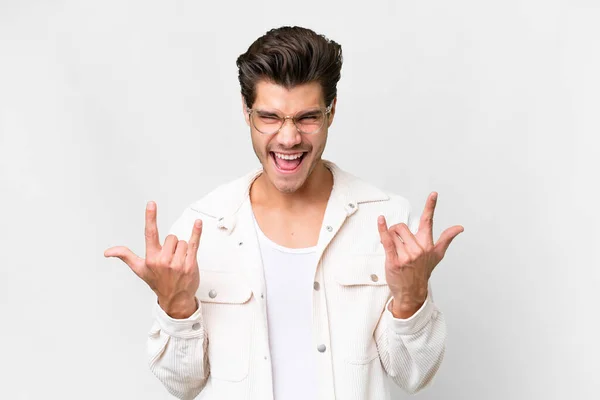 Young Handsome Caucasian Man Isolated White Background Making Horn Gesture — Stockfoto