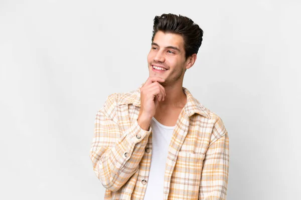 Young Handsome Caucasian Man Isolated White Background Looking While Smiling — Fotografia de Stock