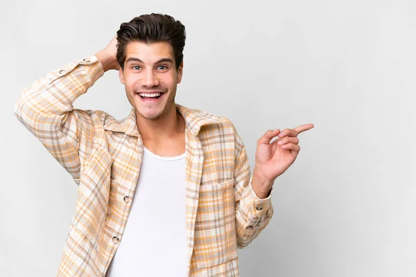 Young Handsome Caucasian Man Isolated White Background Surprised Pointing Finger — 图库照片