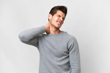 Young handsome caucasian man over isolated white background with neckache