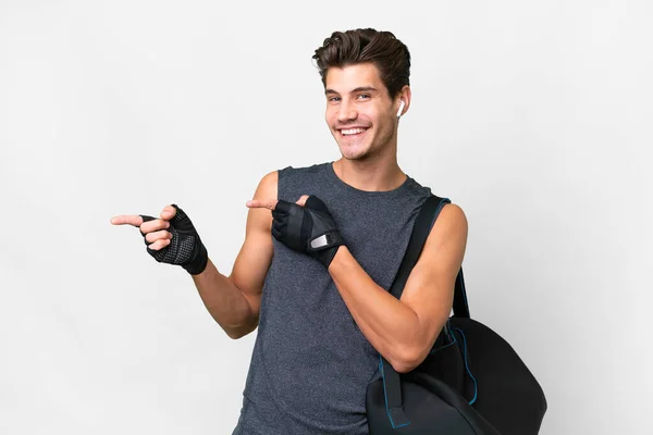Young Sport Caucasian Man Sport Bag Isolated White Background Pointing — Foto de Stock