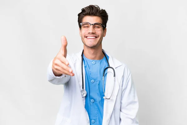 Young Doctor Man Isolated White Background Shaking Hands Closing Good — Stock Photo, Image