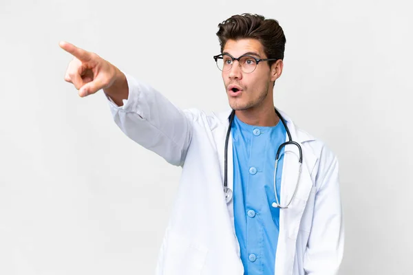 Young Doctor Man Isolated White Background Pointing Away — Stock Photo, Image