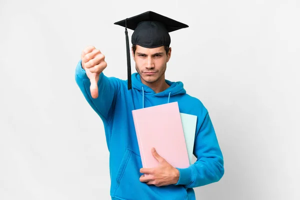 Young University Graduate Man Isolated White Background Showing Thumb Negative — Stok fotoğraf