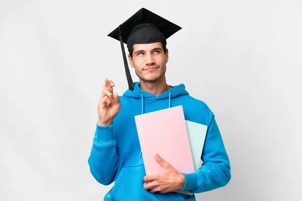 Young University Graduate Man Isolated White Background Fingers Crossing Wishing — Stok fotoğraf