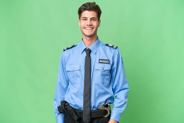 Молодий Поліцейський Над Ізольованим Фоном Сміється — стокове фото