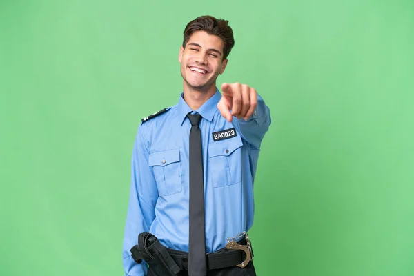 Молодий Поліцейський Над Ізольованими Фоновими Точками Пальцем Впевненим Виразом — стокове фото