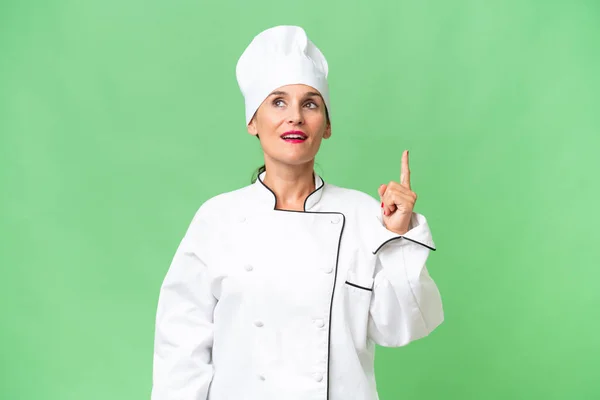 Chef Donna Mezza Età Sfondo Isolato Puntando Sorpreso — Foto Stock