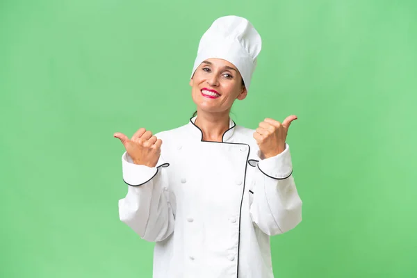 Middle Aged Chef Woman Isolated Background Thumbs Gesture Smiling — Stock Photo, Image