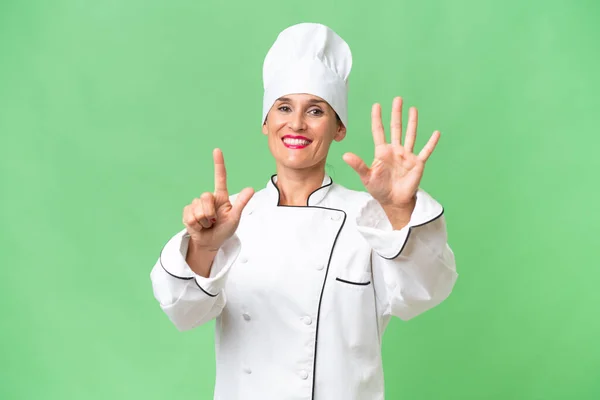 Chef Donna Mezza Età Sfondo Isolato Contando Sette Con Dita — Foto Stock