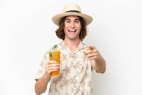 Young Handsome Man Holding Cocktail Isolated White Background Surprised Pointing — Stock Photo, Image