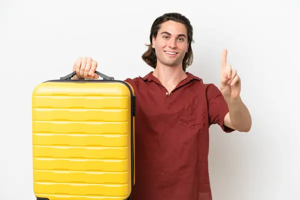 Fiatal Jóképű Férfi Elszigetelt Fehér Háttér Nyaralás Utazási Bőrönd Számolás — Stock Fotó