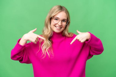 Young English woman over isolated background proud and self-satisfied