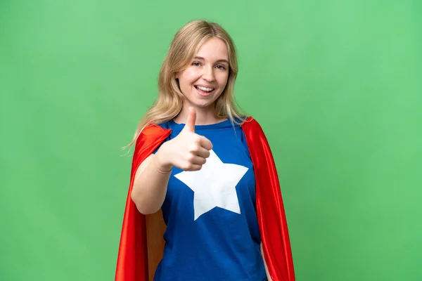 Super Hero English woman over isolated background with thumbs up because something good has happened