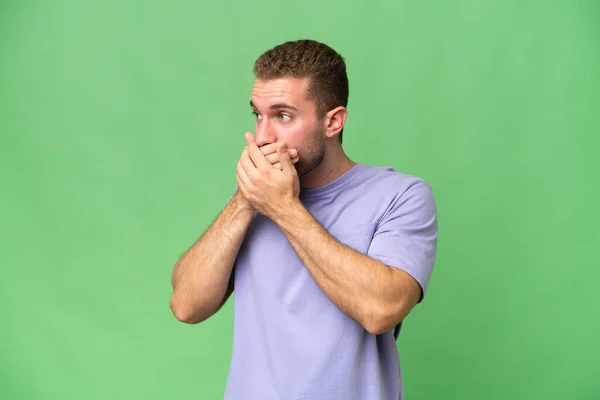 Young Handsome Caucasian Man Isolated Green Chroma Background Covering Mouth — Stock Photo, Image