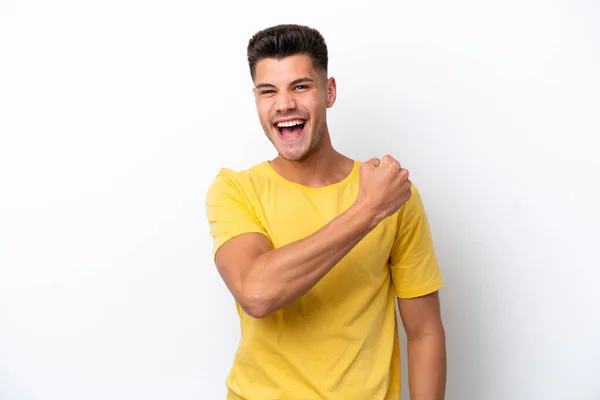 Beyaz Arka Planda Izole Edilmiş Genç Beyaz Adam Zaferi Kutluyor — Stok fotoğraf