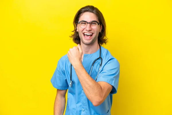 Young Surgeon Caucasian Man Isolated Yellow Background Celebrating Victory — Stock Photo, Image