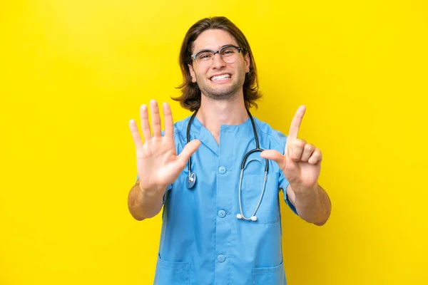 Young Surgeon Caucasian Man Isolated Yellow Background Counting Seven Fingers — Stock Photo, Image