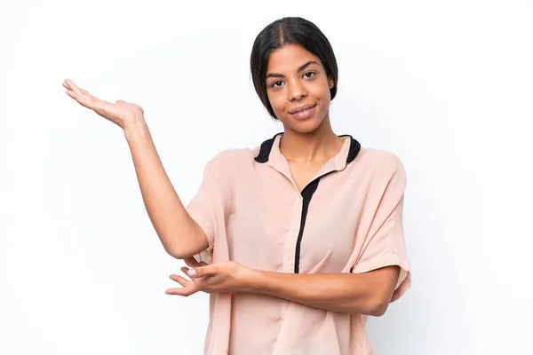 stock image Young African american woman isolated on white background extending hands to the side for inviting to come