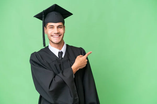 Jovem Universidade Pós Graduação Caucasiano Homem Sobre Isolado Fundo Apontando — Fotografia de Stock