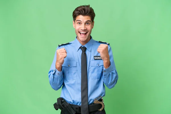 Молодий Поліцейський Над Ізольованим Тлом Святкує Перемогу Посаді Переможця — стокове фото