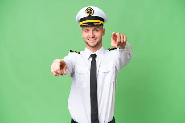 Fliegerpilot Mann Über Isoliertem Hintergrund Zeigt Lächelnd Mit Dem Finger — Stockfoto