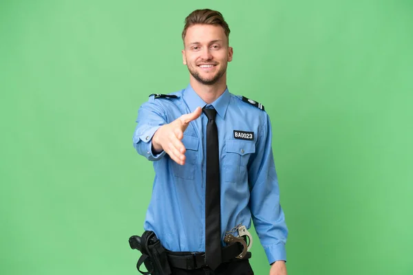 Jonge Politieman Geïsoleerde Achtergrond Schudden Handen Voor Het Sluiten Van — Stockfoto