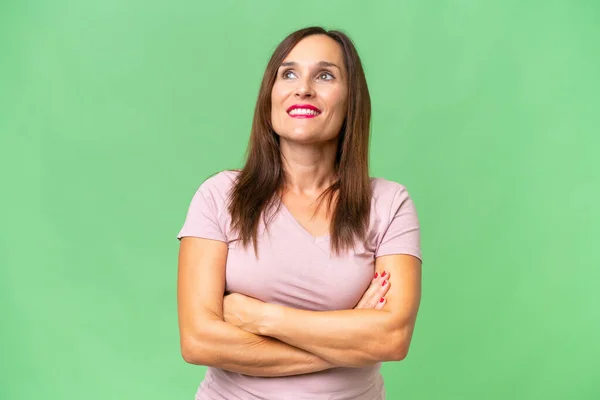 Middle Aged Caucasian Woman Isolated Background Looking While Smiling — Stock Photo, Image