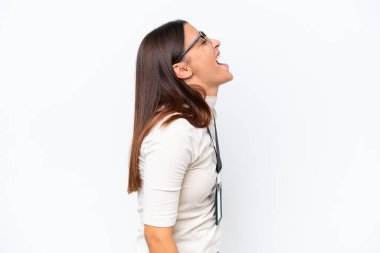 Young caucasian woman with ID card isolated on white background laughing in lateral position