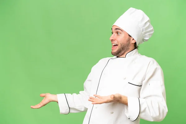 Jovem Bonito Chef Homem Sobre Isolado Fundo Com Surpresa Facial — Fotografia de Stock