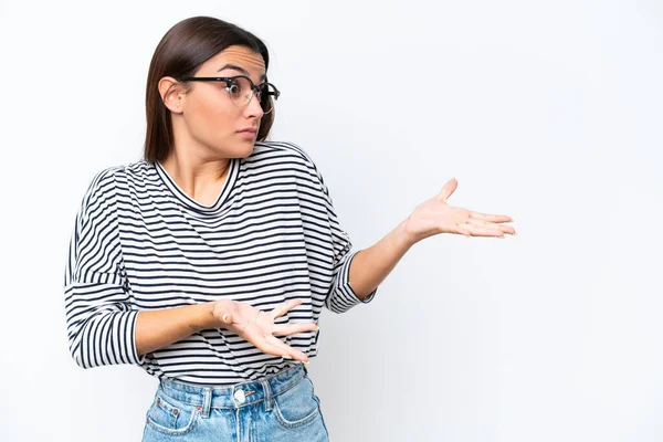 stock image Young caucasian woman isolated on white background with surprise expression while looking side