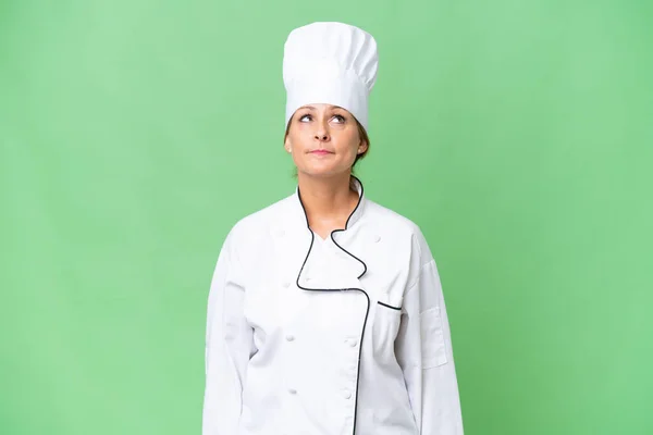 Chef Donna Mezza Età Sfondo Isolato Guardando Alto — Foto Stock