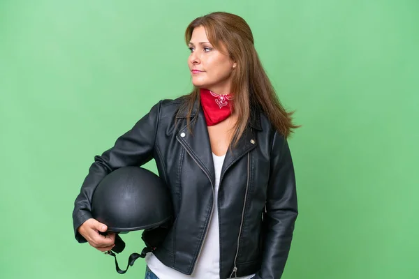 Middle Aged Caucasian Woman Motorcycle Helmet Isolated Background Looking Side — Stock Photo, Image