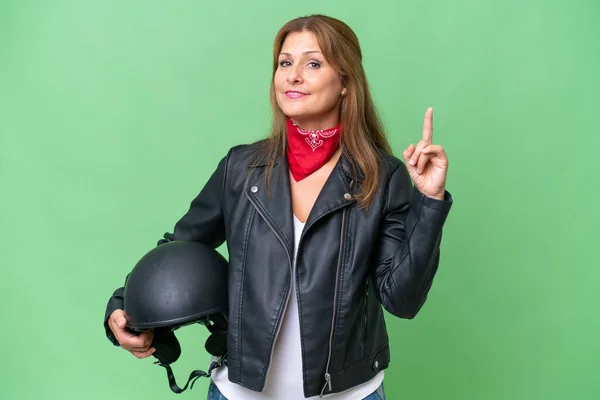 Middle Aged Caucasian Woman Motorcycle Helmet Isolated Background Showing Lifting — Stock Photo, Image