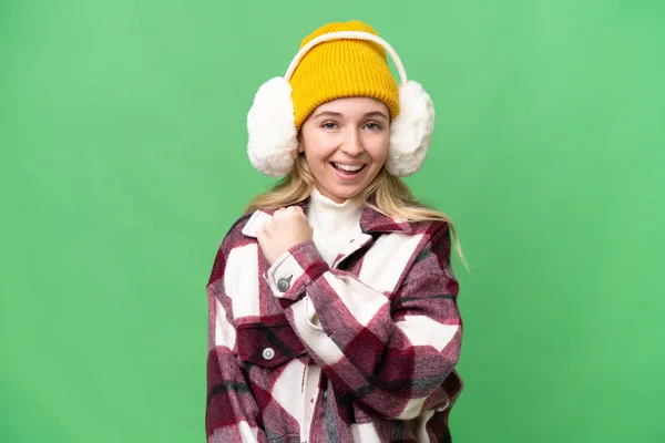 Young English Woman Wearing Winter Muffs Isolated Background Celebrating Victory — Stock Photo, Image