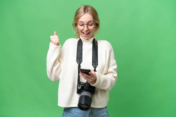 Young Photographer English Woman Isolated Background Surprised Sending Message — Stock Photo, Image