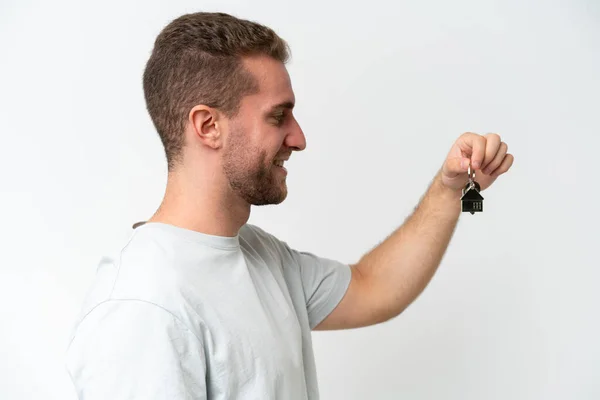 Young Caucasian Man Holding Home Keys Isolated White Background Happy — Foto de Stock