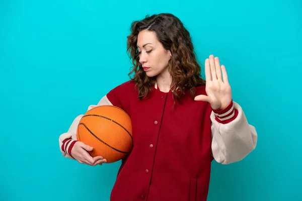 Young Caucasian Basketball Player Woman Isolated Blue Background Making Stop — Stok Foto