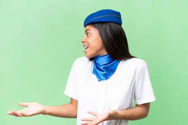 stock image Airplane stewardess African american woman over isolated background with surprise facial expression