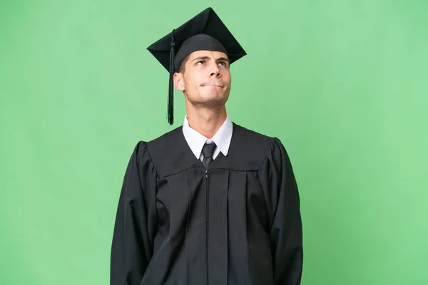 Jovem Universidade Pós Graduação Caucasiano Homem Sobre Isolado Fundo Olhando — Fotografia de Stock
